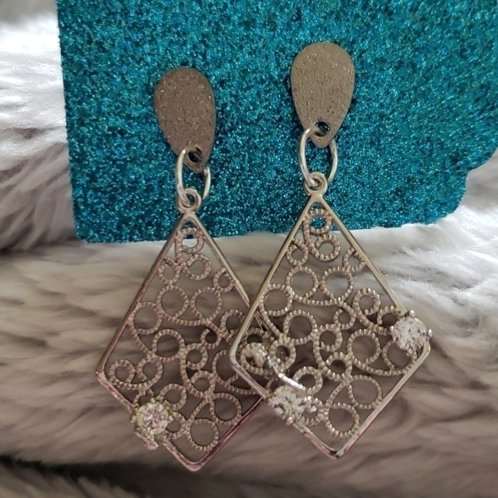 Silver studded earrings with cubic zirconia accent